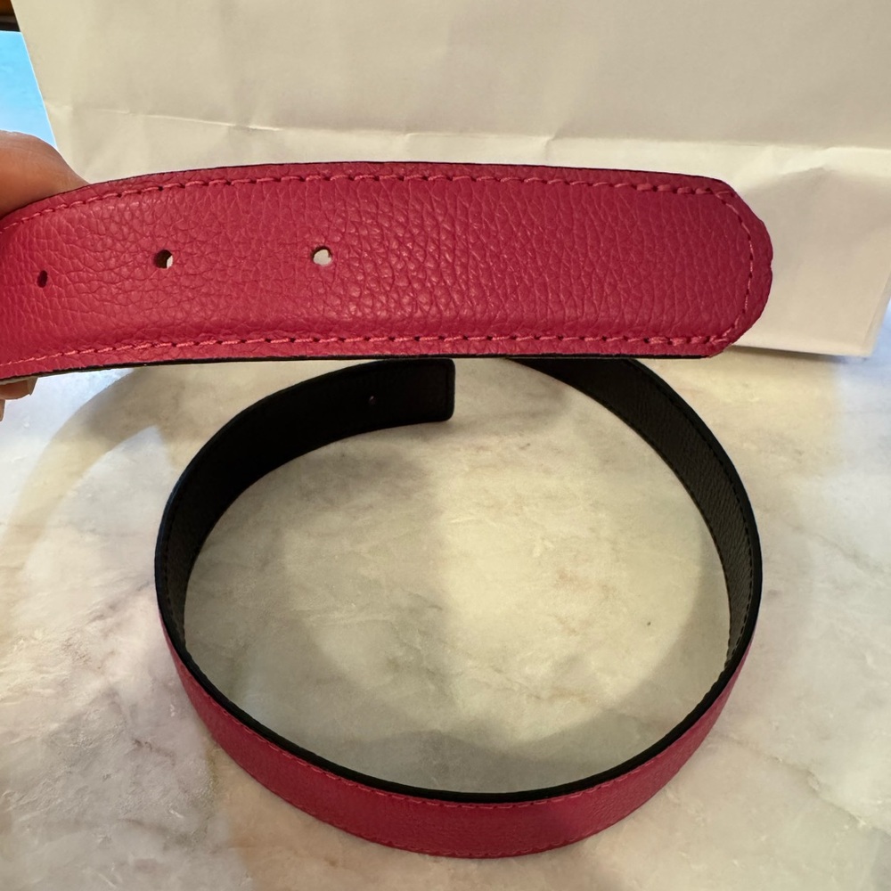 Women’s reversible pink/black leather strap 32mm (1.25 inches) wide; size 85